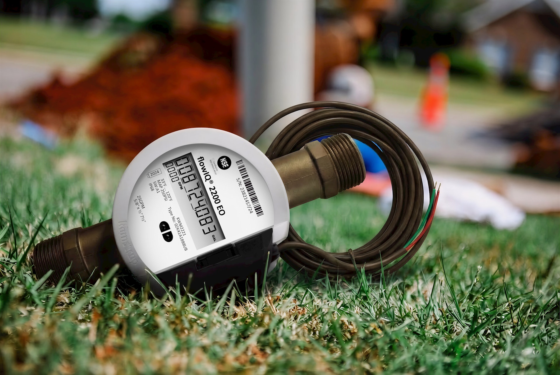 Kamstrup Encoded Output Meter on grass - 1920 px x 1288 px