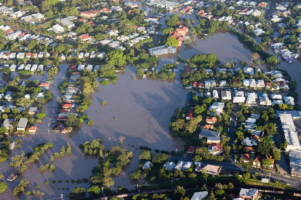 birds eye view of floods over a suburb