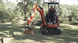 Operating the excavator for digging