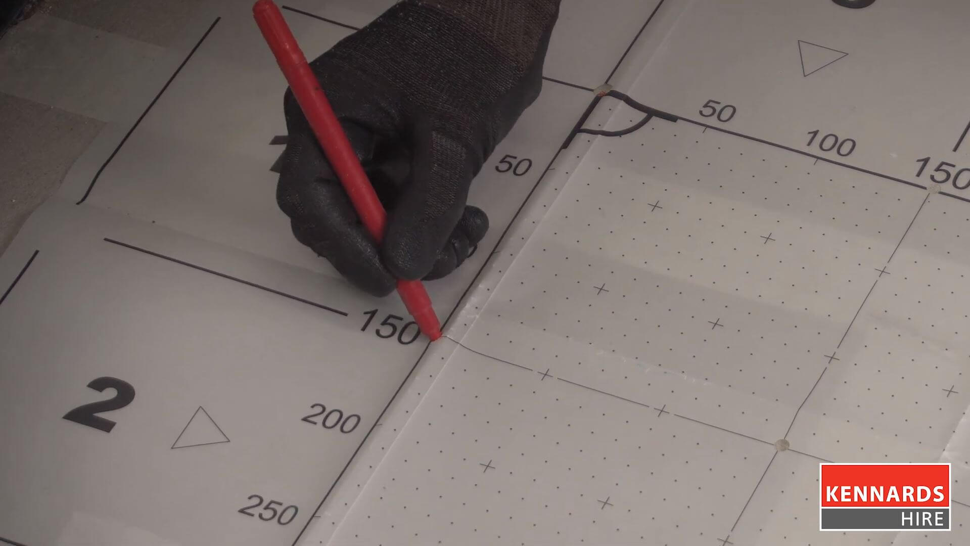 Marking holes prior to removing the grid paper