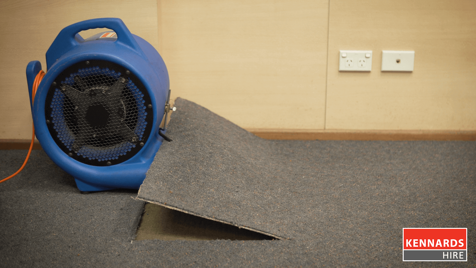 Step 2 - Placing the blower nozzle under the carpet