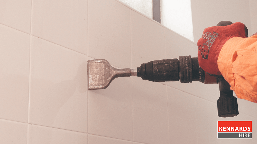 Using the wide Chisel attachment for removing tiles