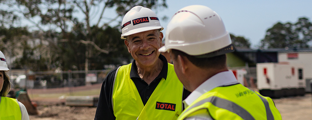 construction site managers on site talking