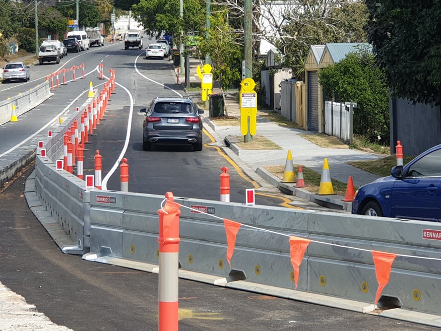 Kennards Hire steel barriers being used to manage traffic on a road