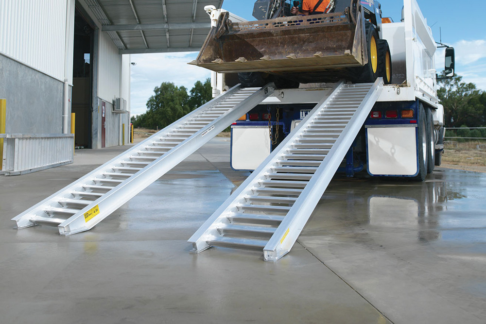 kennards hire ramps 4.8T in use with machinery rolling down