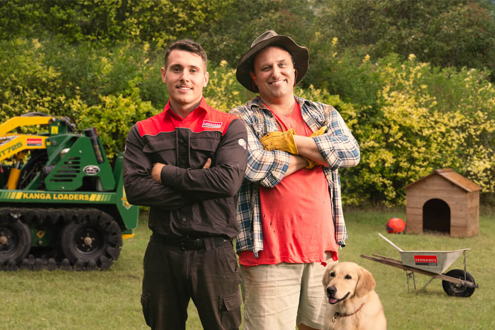 Kennards Hire team member and a DIYer standing side-by-side