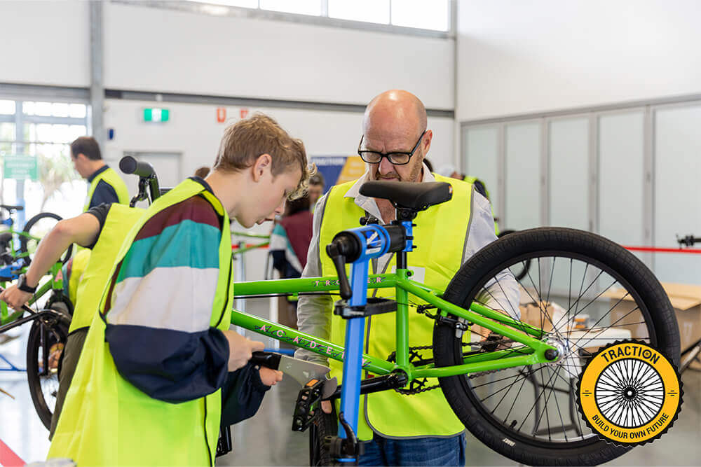 Kennards Hire team member participating in the TRACTION Bike Build event