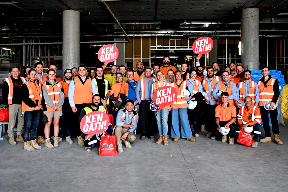 Kennards hire Tradie Day 2026 with group photo holding up ken oath signs
