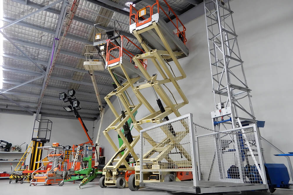 Two scissor lifts extended