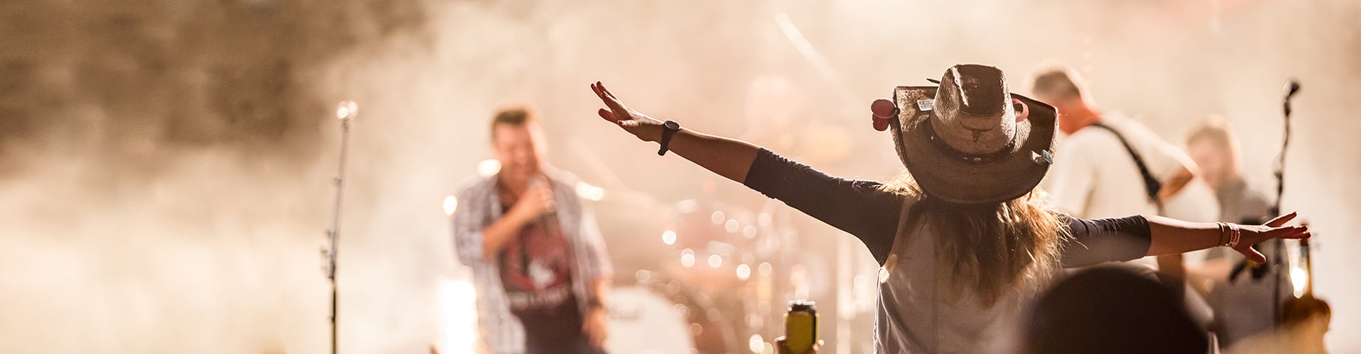 person in a crowd dancing at a concert