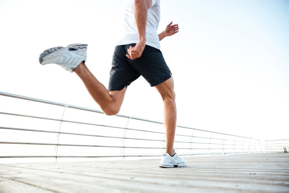 bottom half of man running
