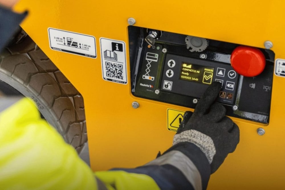 Kennards hire team member using equipment