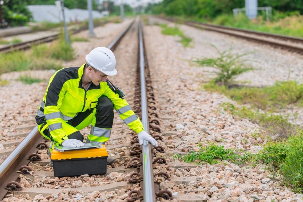 Kennards Hire team member working on rail 