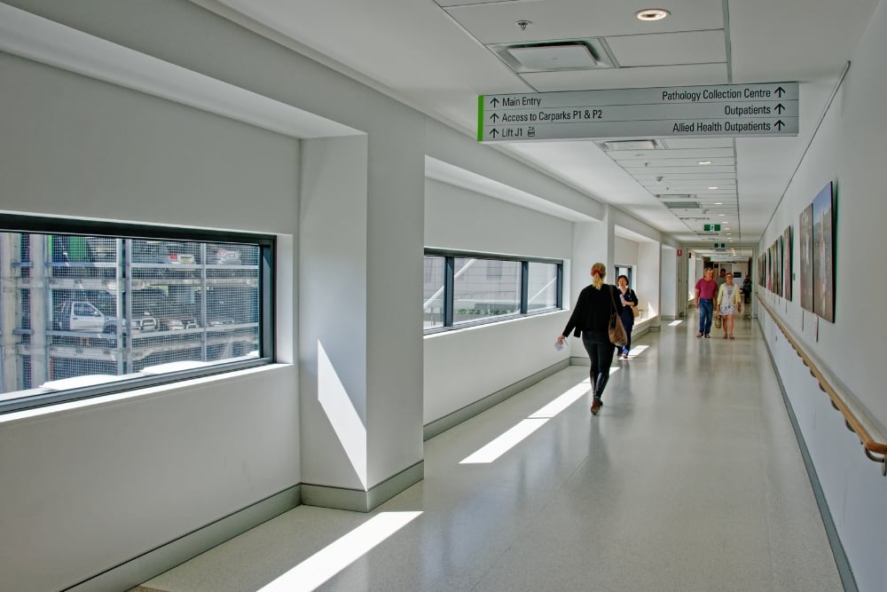 Government hospital with a person walking through the halls