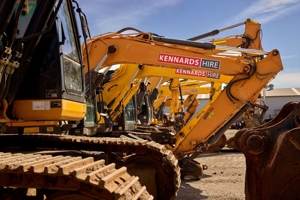 Kennards Hire Machinery lined up in the yard