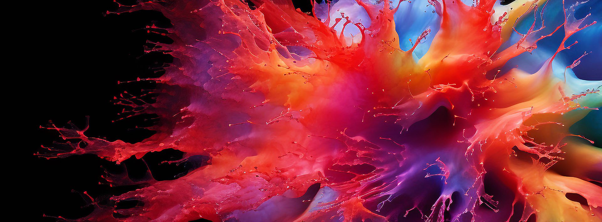 Lewis Silkin Abstract liquid explosion in shades of red, yellow, blue and purple on a black background