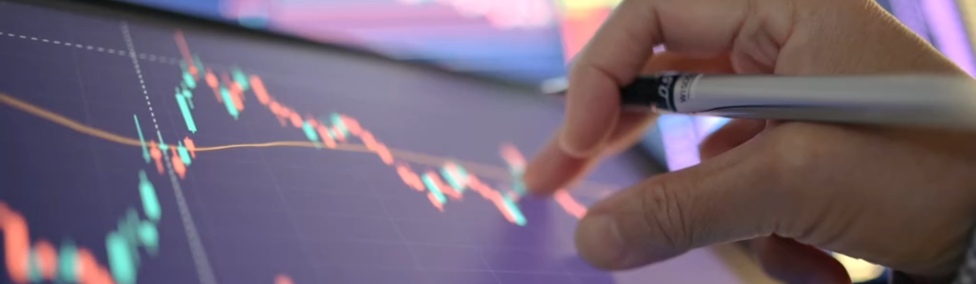 Person using a pinch function on a digital display of a chart whilst holding a stylus