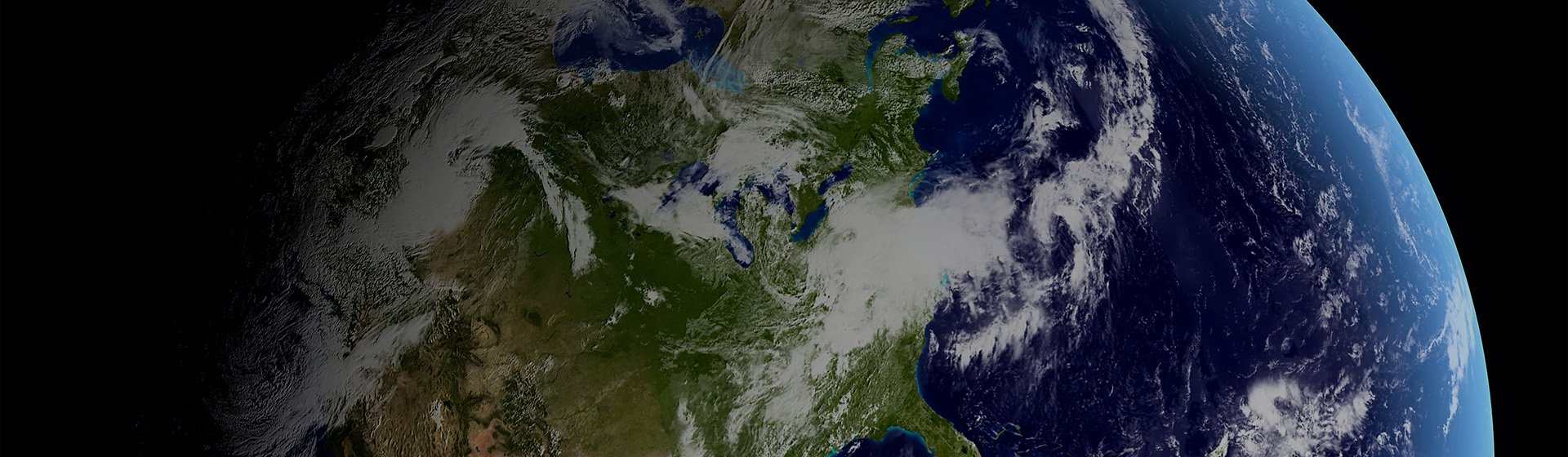Lewis Silkin The earth seen from space, there is a light covering of cloud over North America