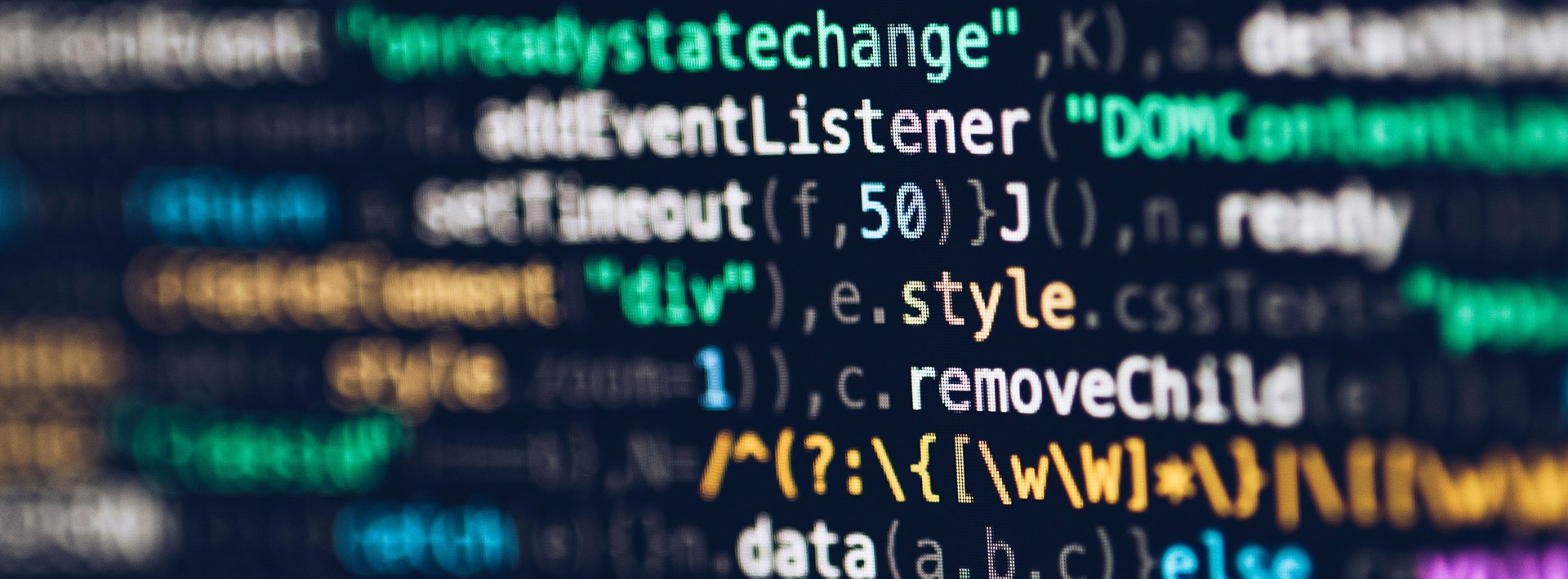 Lewis Silkin A close up of a dark screen of coding language with elements of the text highlighted in blue, pink and orange