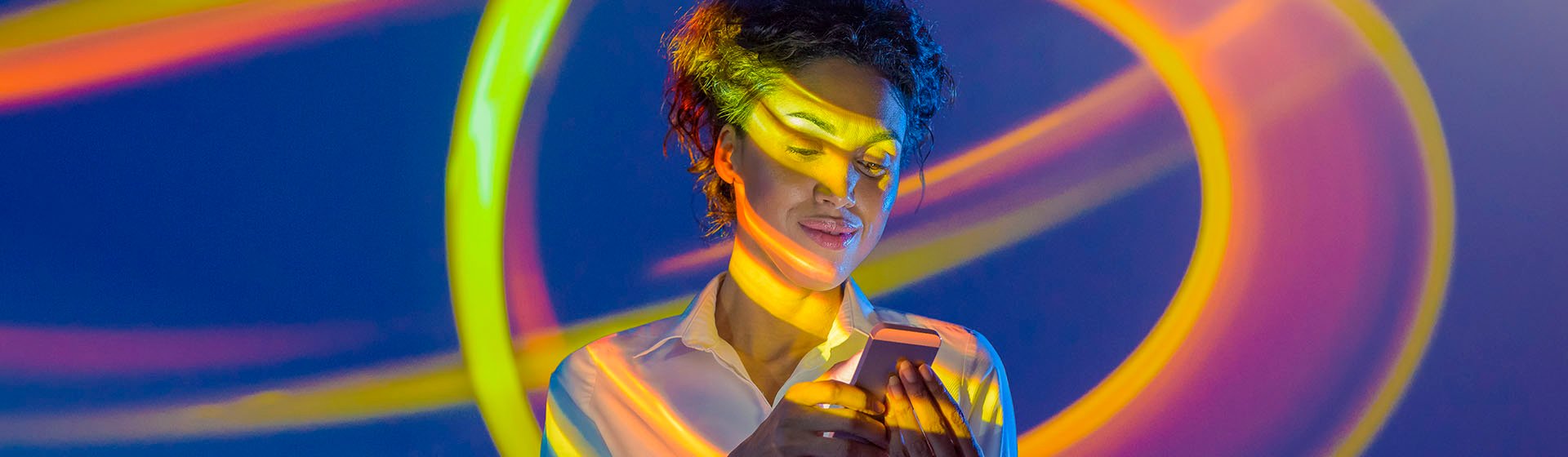 Lewis Silkin woman-using-phone-projection_manage-your-workforce_2024_banner