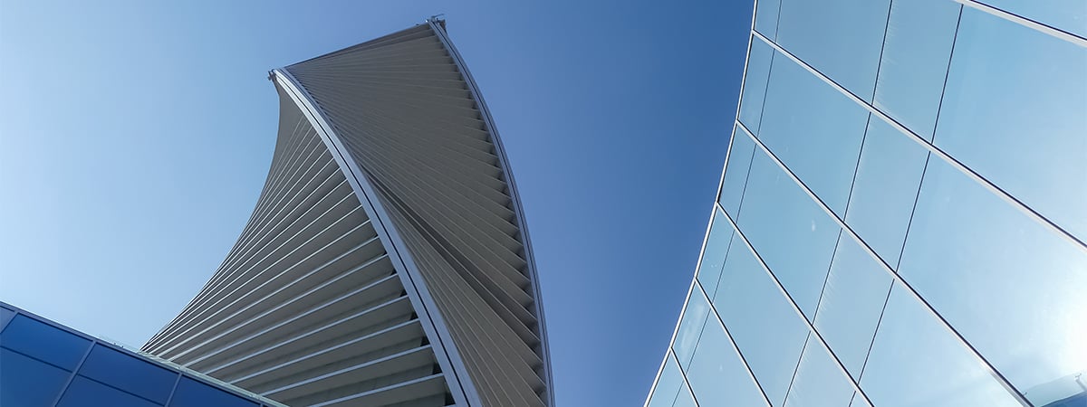 Lewis Silkin Glass office buildings viewed from below reaching into the sky.