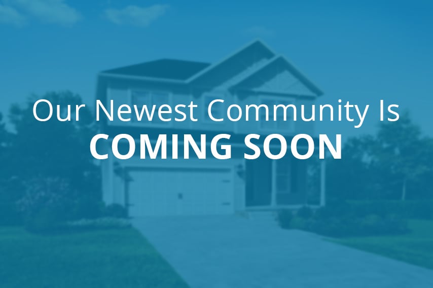 Our newest community is coming soon text overlaid on blurred home photo