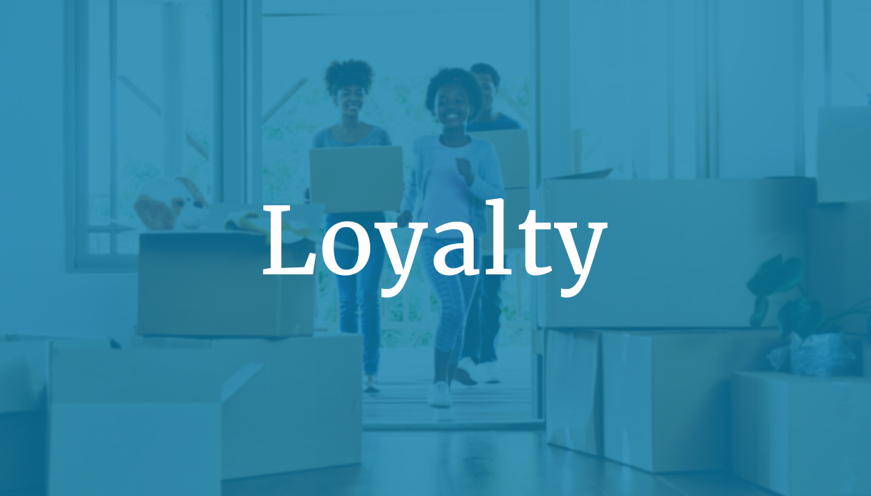 Loyalty text overlaid on image of family with moving boxes