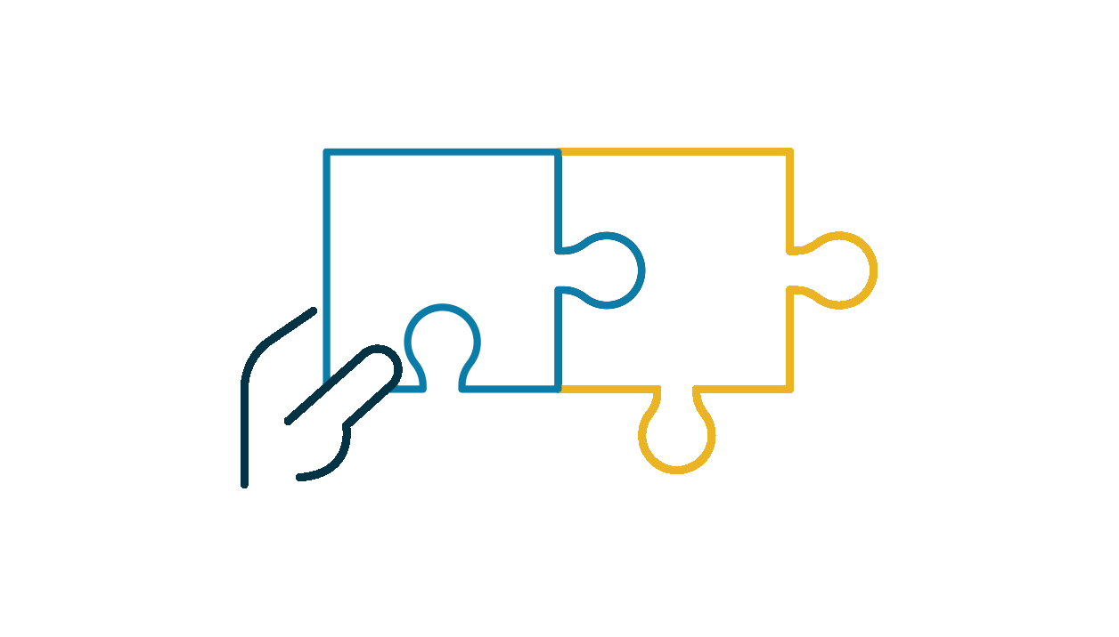 hand holding puzzle pieces