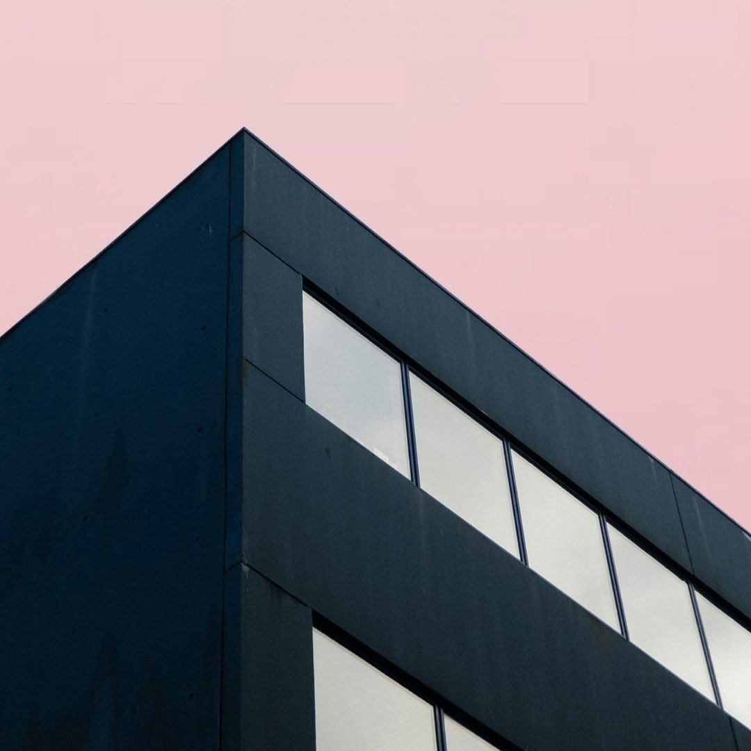 black building pink sky
