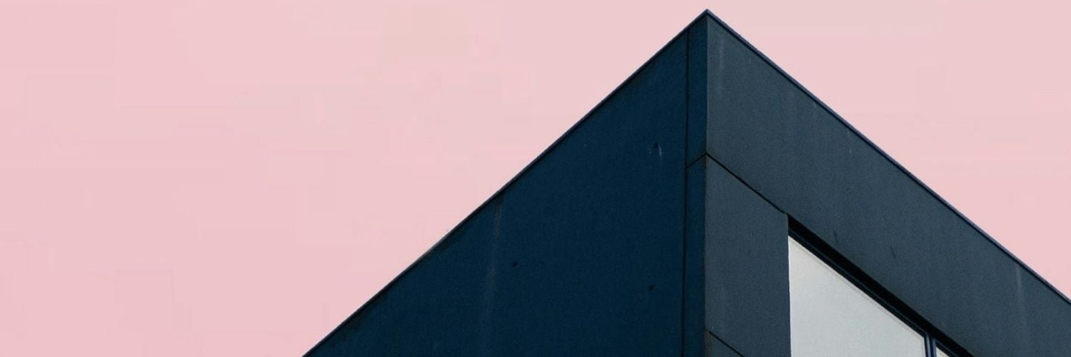 black building pink sky