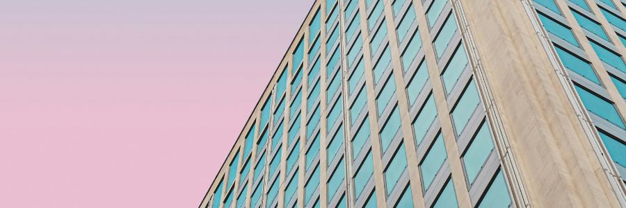 flats against a multicoloured sky