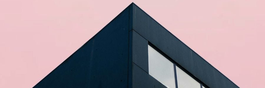 black building pink sky