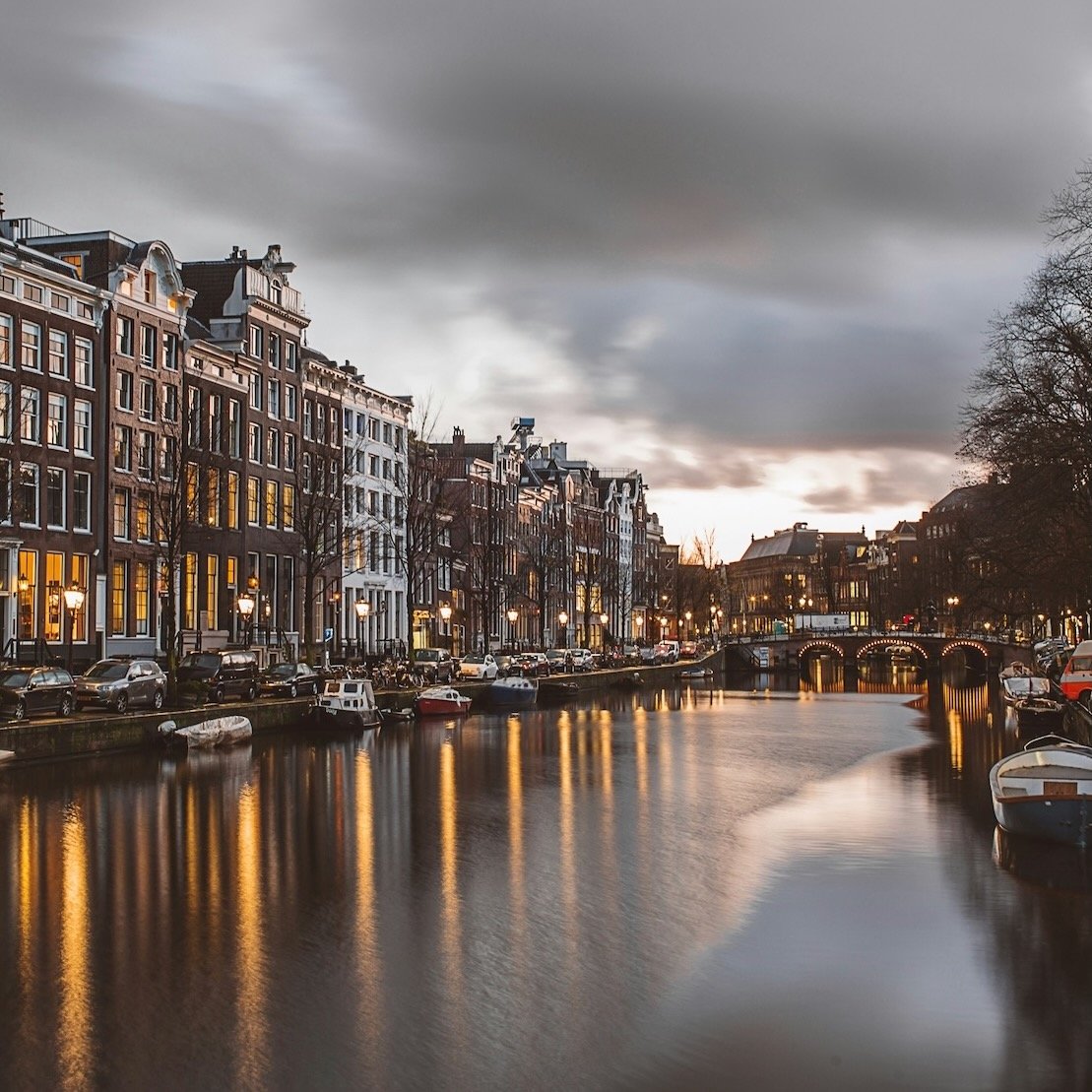 A canal in Amsterdam at dusk