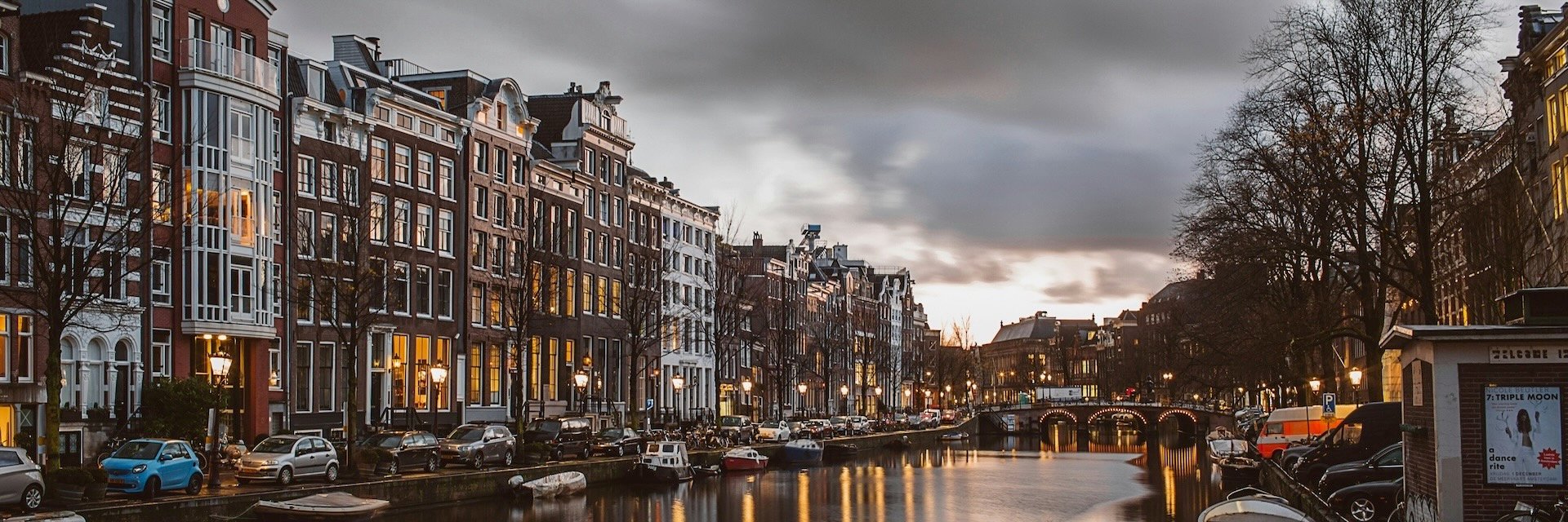 A canal in Amsterdam at dusk