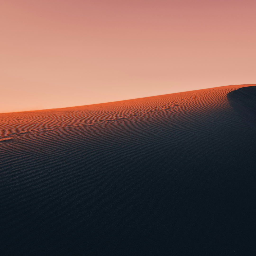 Desert_dune_shadows_dark_sunset