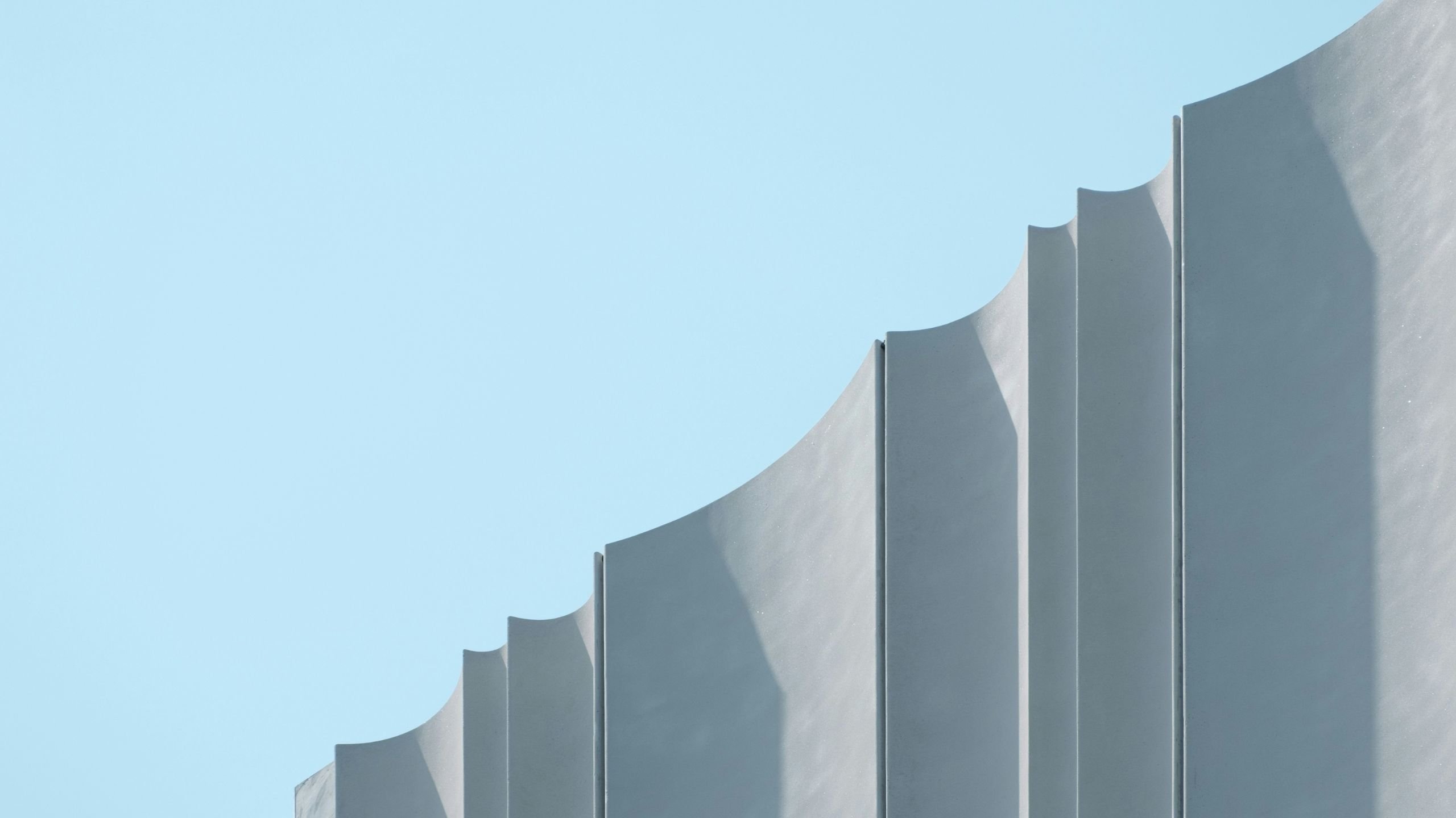 Curved white building