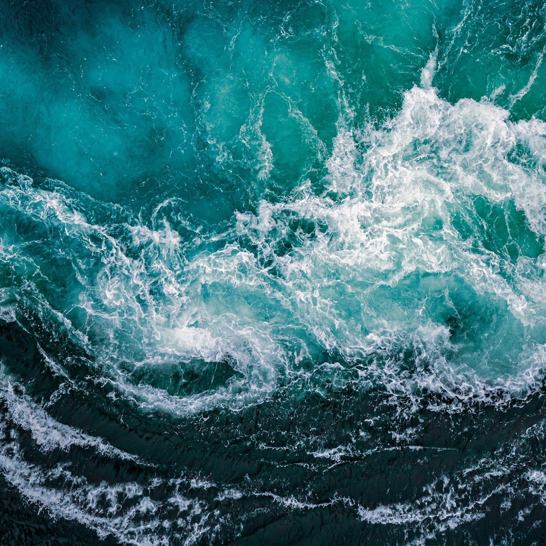 Waves of water of the river and the sea