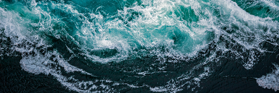 Waves of water of the river and the sea