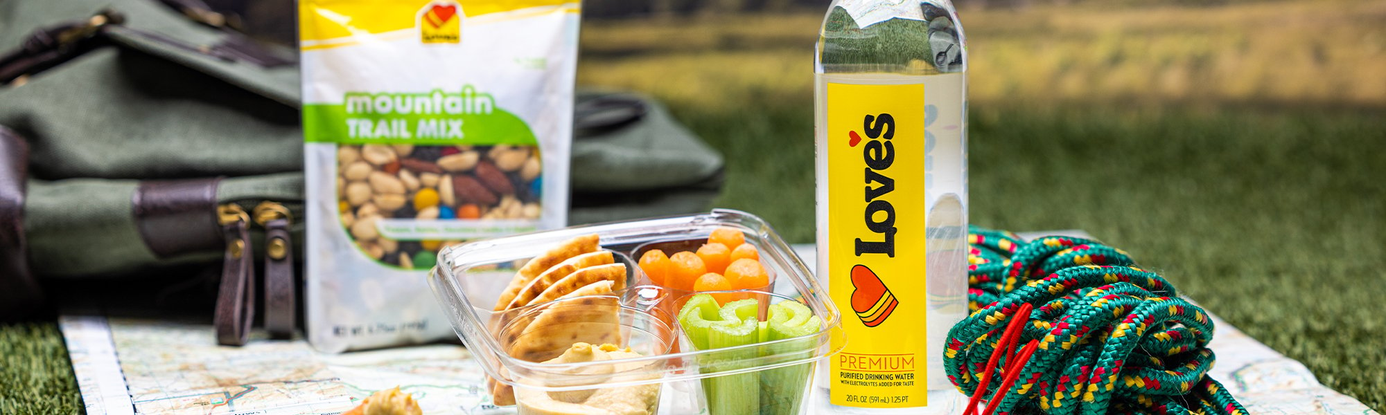 Love's premium water, hummus snack tray and mountain trail mix