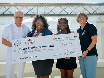 Musket and Trillium reps presenting a check to Texas Children's Hospital