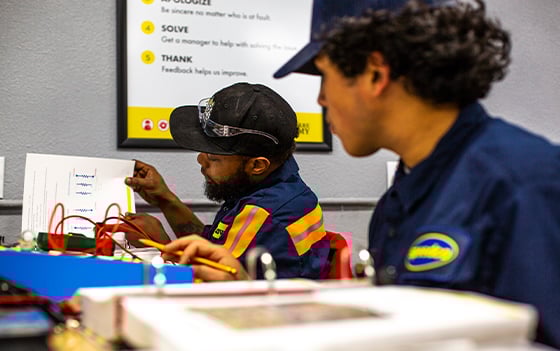 Truck Care Academy students learning in a classroom