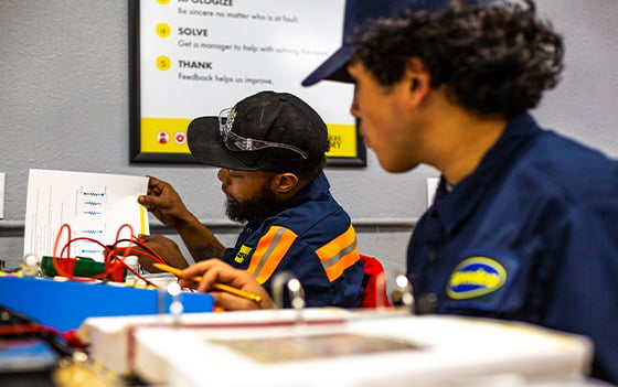 Truck Care Academy students learning in a classroom