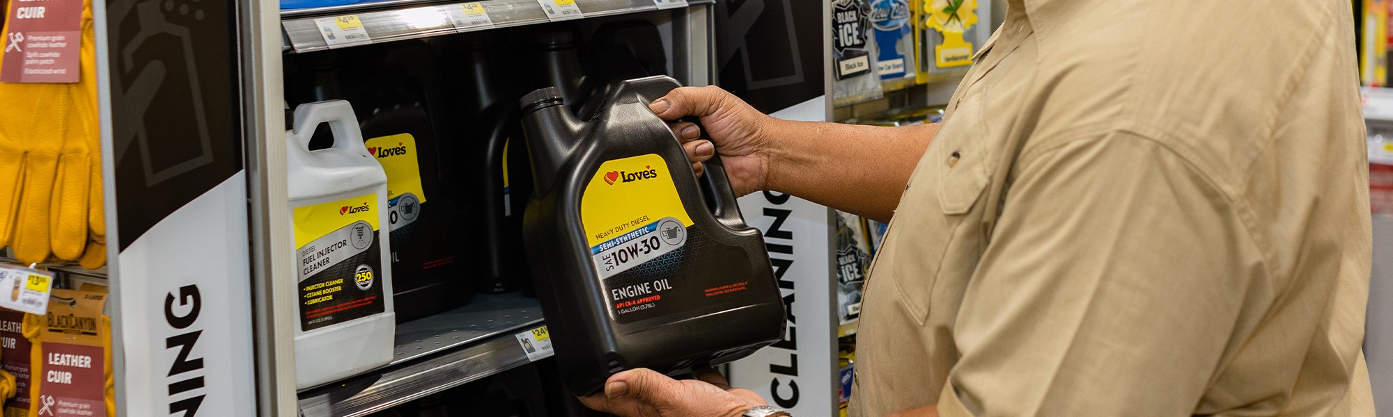 A photo of a customer holding Love's 10W-30 Engine Oil