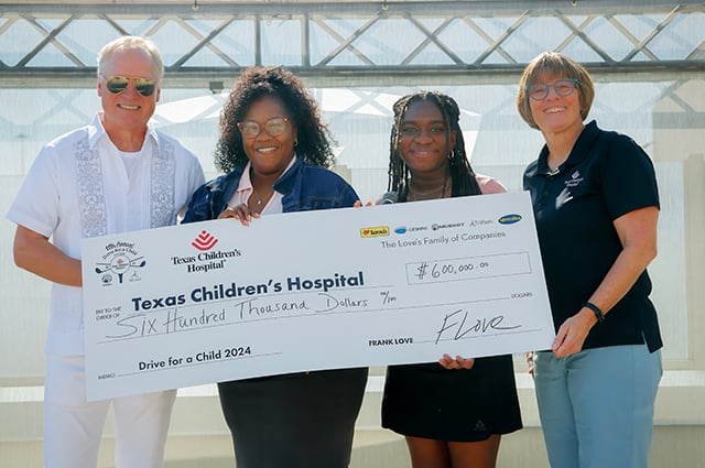 Musket and Trillium reps presenting a check to Texas Children's Hospital