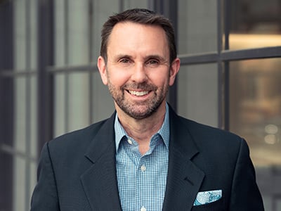 Headshot of Tim Langley-Hawthorne