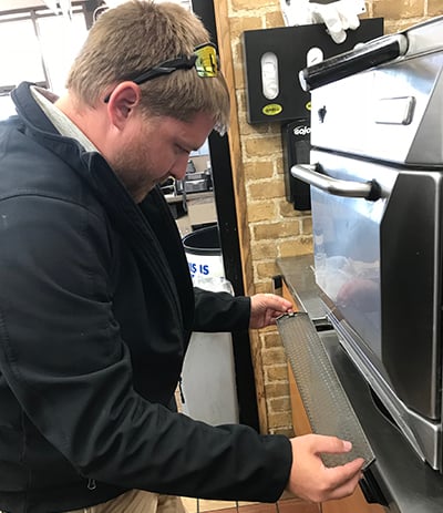 loves maintenance man fixing oven