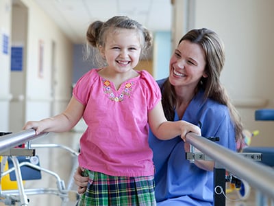 A photo of a Children's Miracle Network patient and doctor