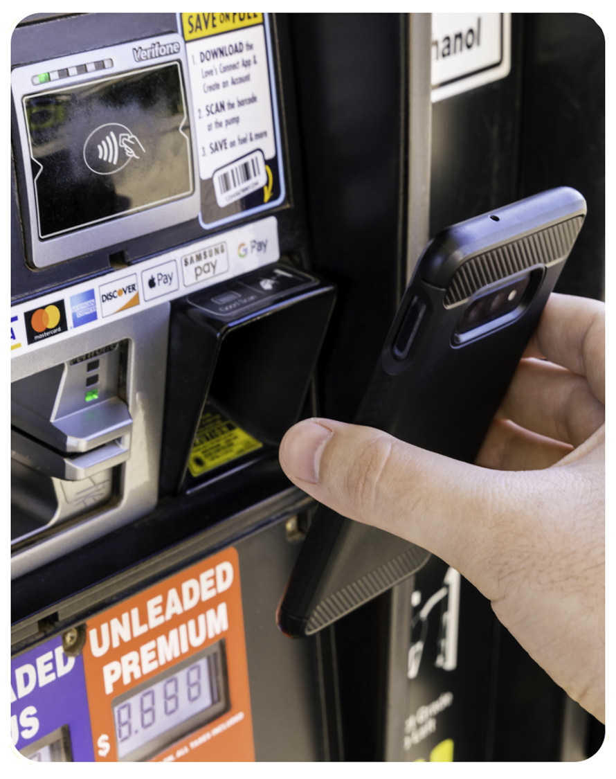 A photo of a customer scanning their Love's Connect App at the pump