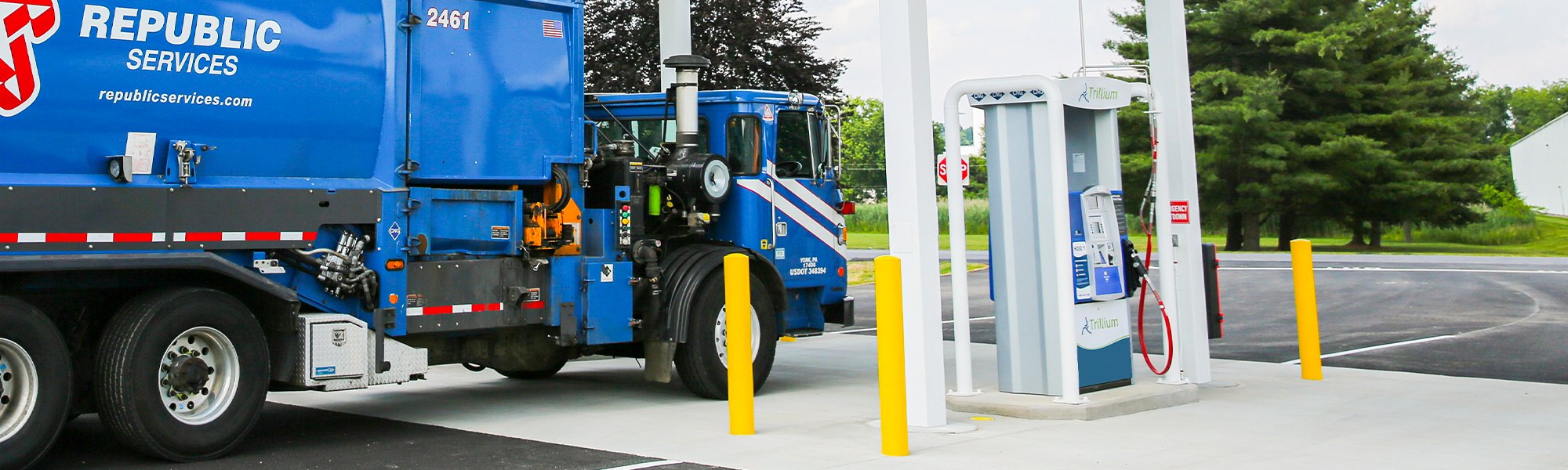 Photo of waste trucks at a Trillium station fueling