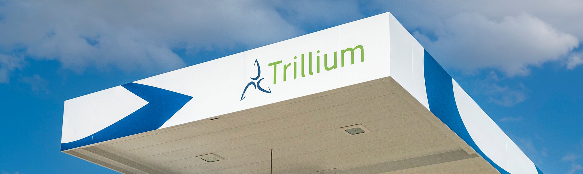 A Trillium station canopy with the sky in the background